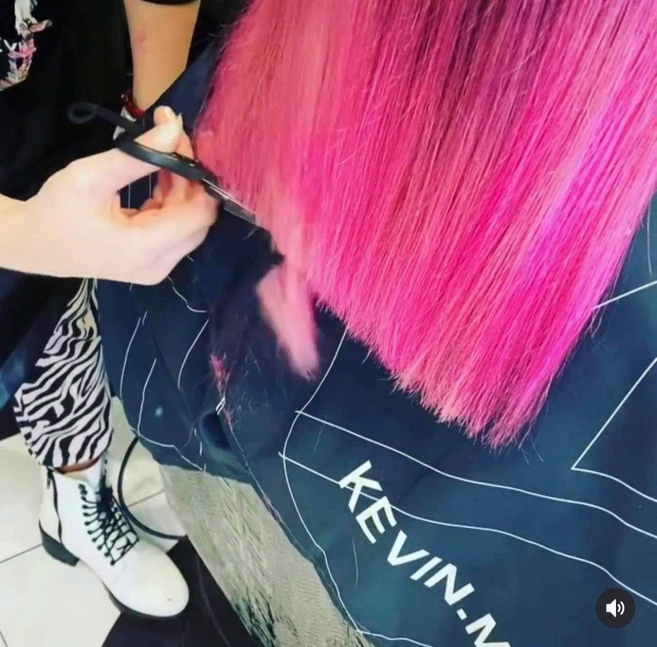 Precision cut on vivid pink hair